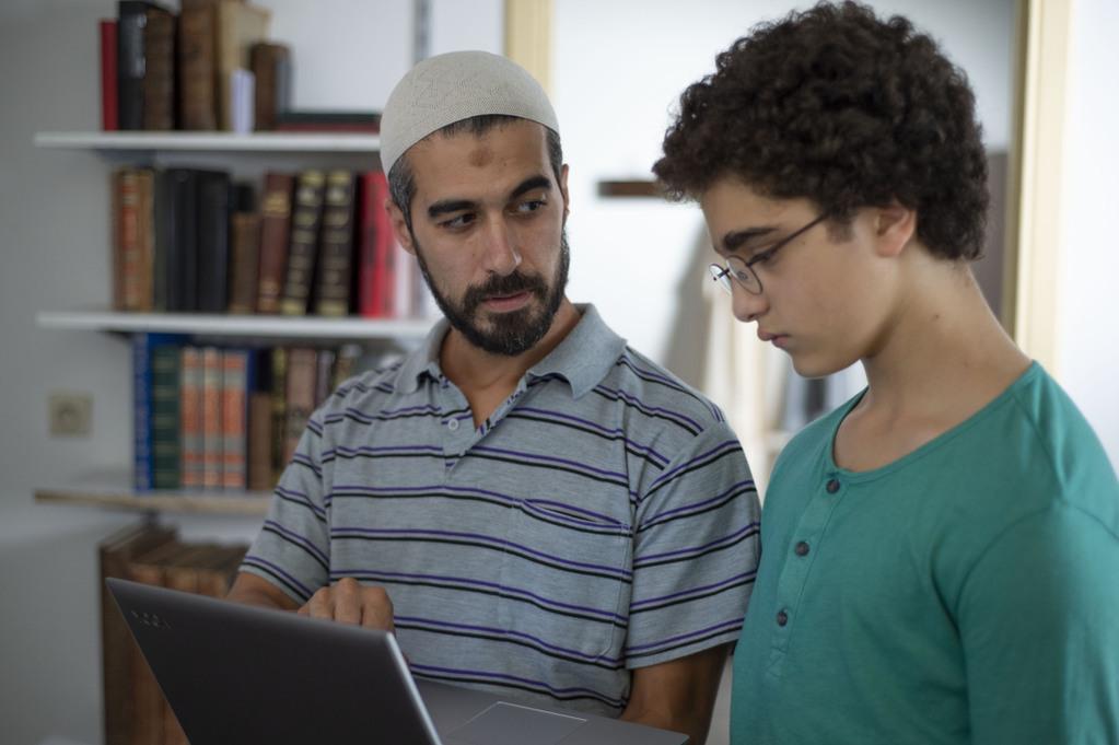 Le jeune Ahmed et son imam